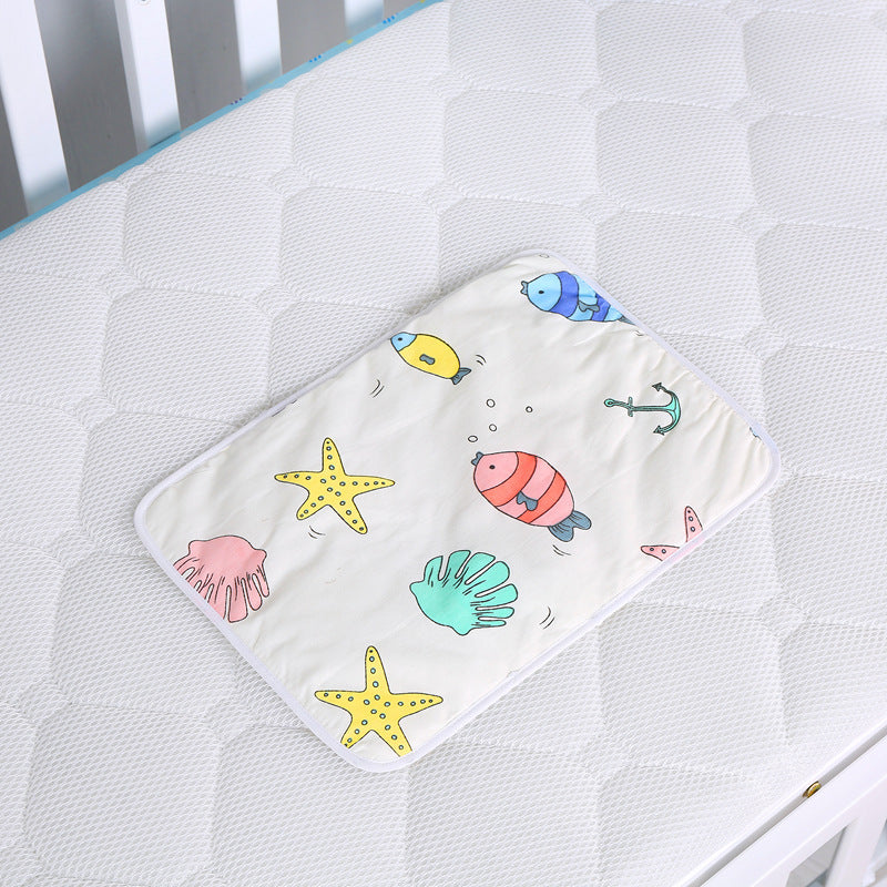 Organisateur de couches suspendu pour table à langer ou lit/ oBaby cotton portable diaper changing pad
