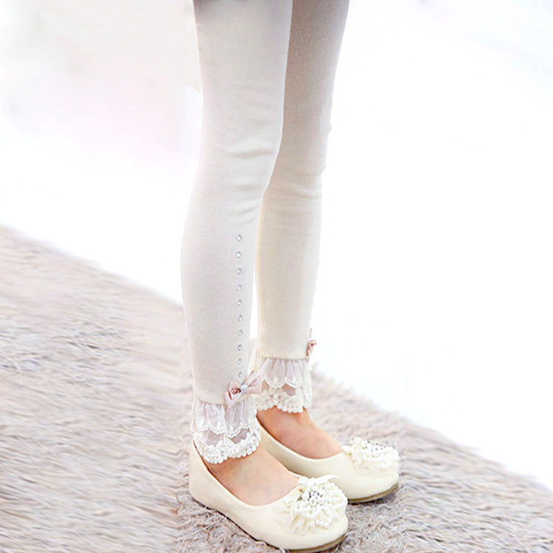 Leggings avec joli nœud et bas volanté en dentelle