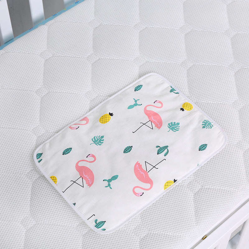Organisateur de couches suspendu pour table à langer ou lit/ oBaby cotton portable diaper changing pad