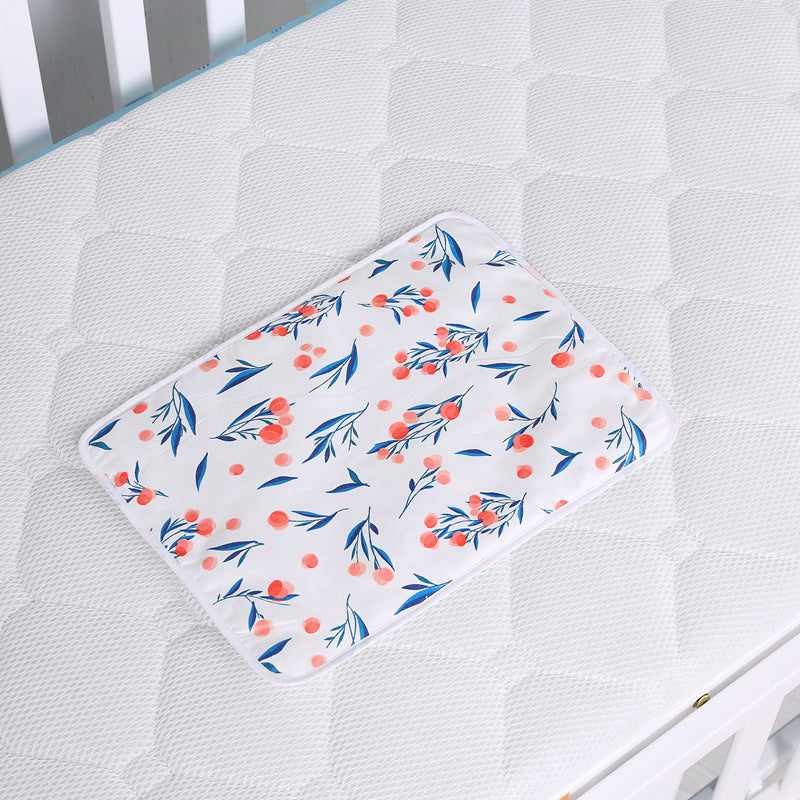 Organisateur de couches suspendu pour table à langer ou lit/ oBaby cotton portable diaper changing pad