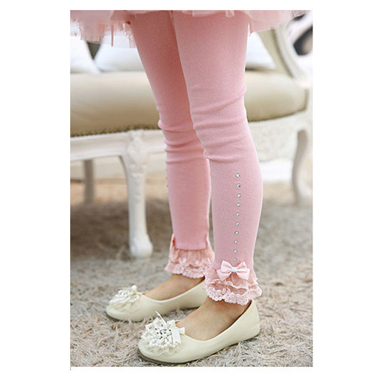 Leggings avec joli nœud et bas volanté en dentelle