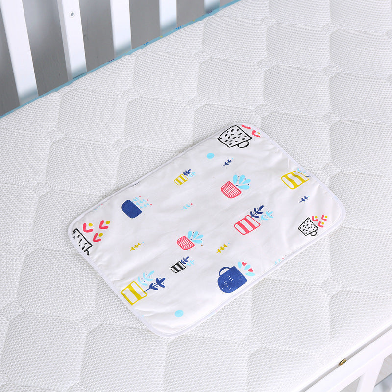Organisateur de couches suspendu pour table à langer ou lit/ oBaby cotton portable diaper changing pad