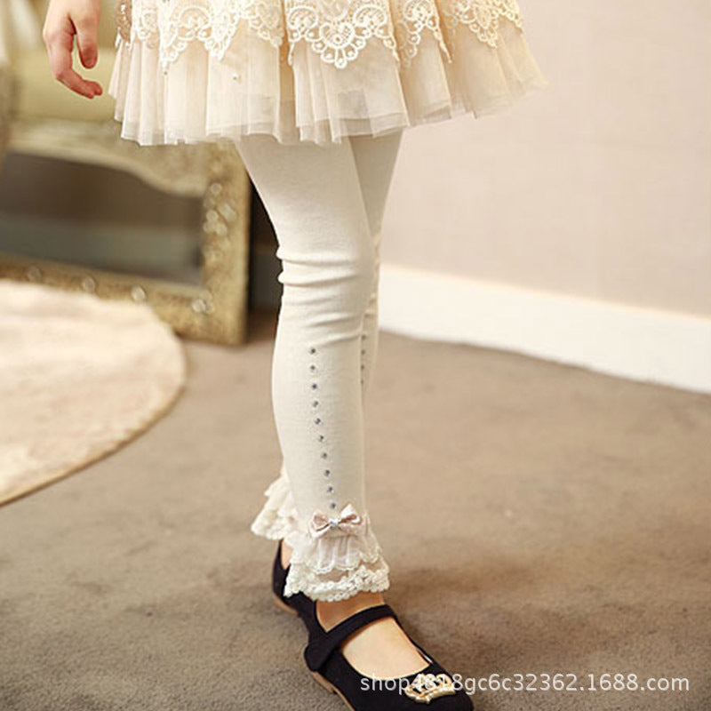 Leggings avec joli nœud et bas volanté en dentelle